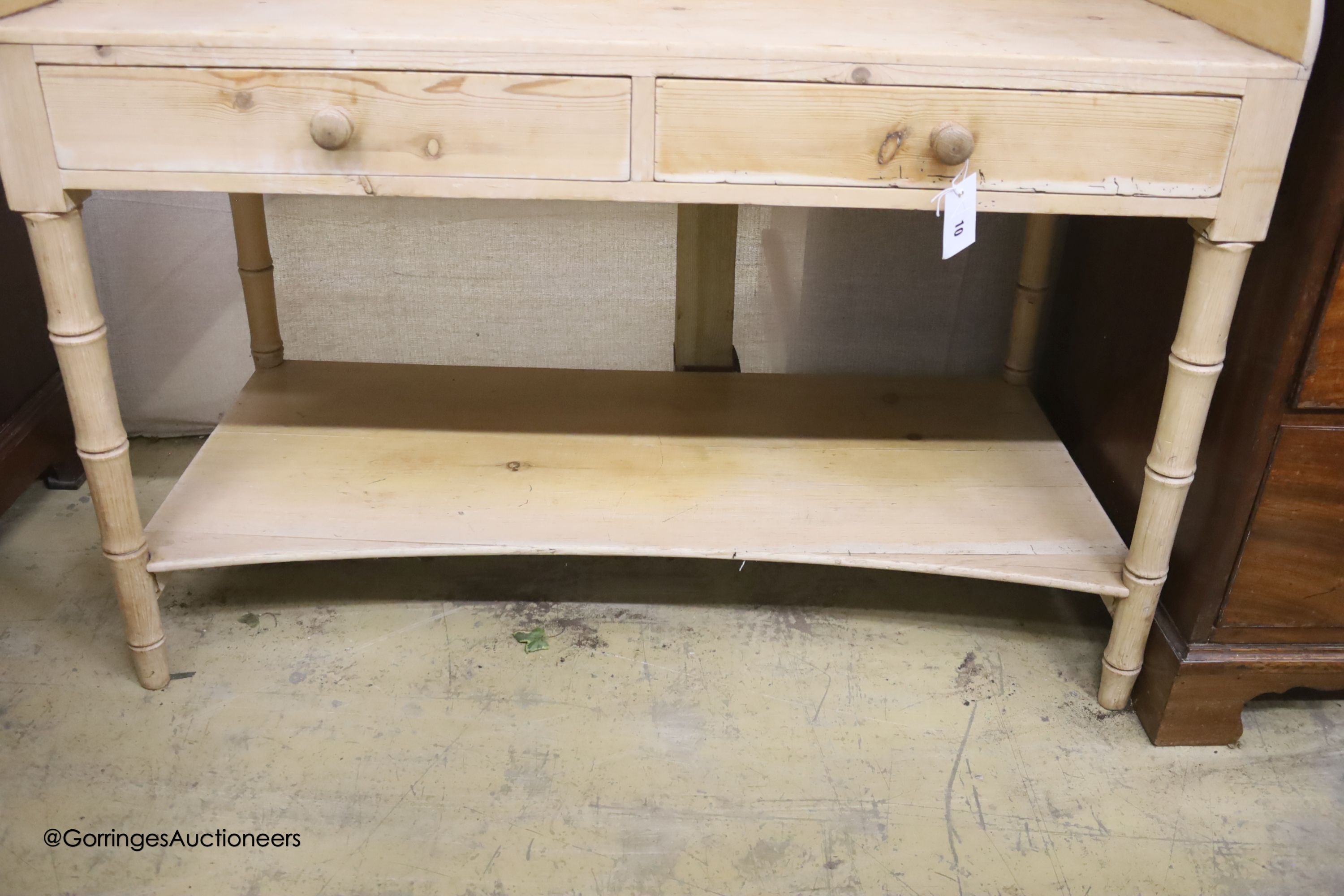 An early 19th century pine two tier washstand, width 105cm, depth 50cm, height 93cm